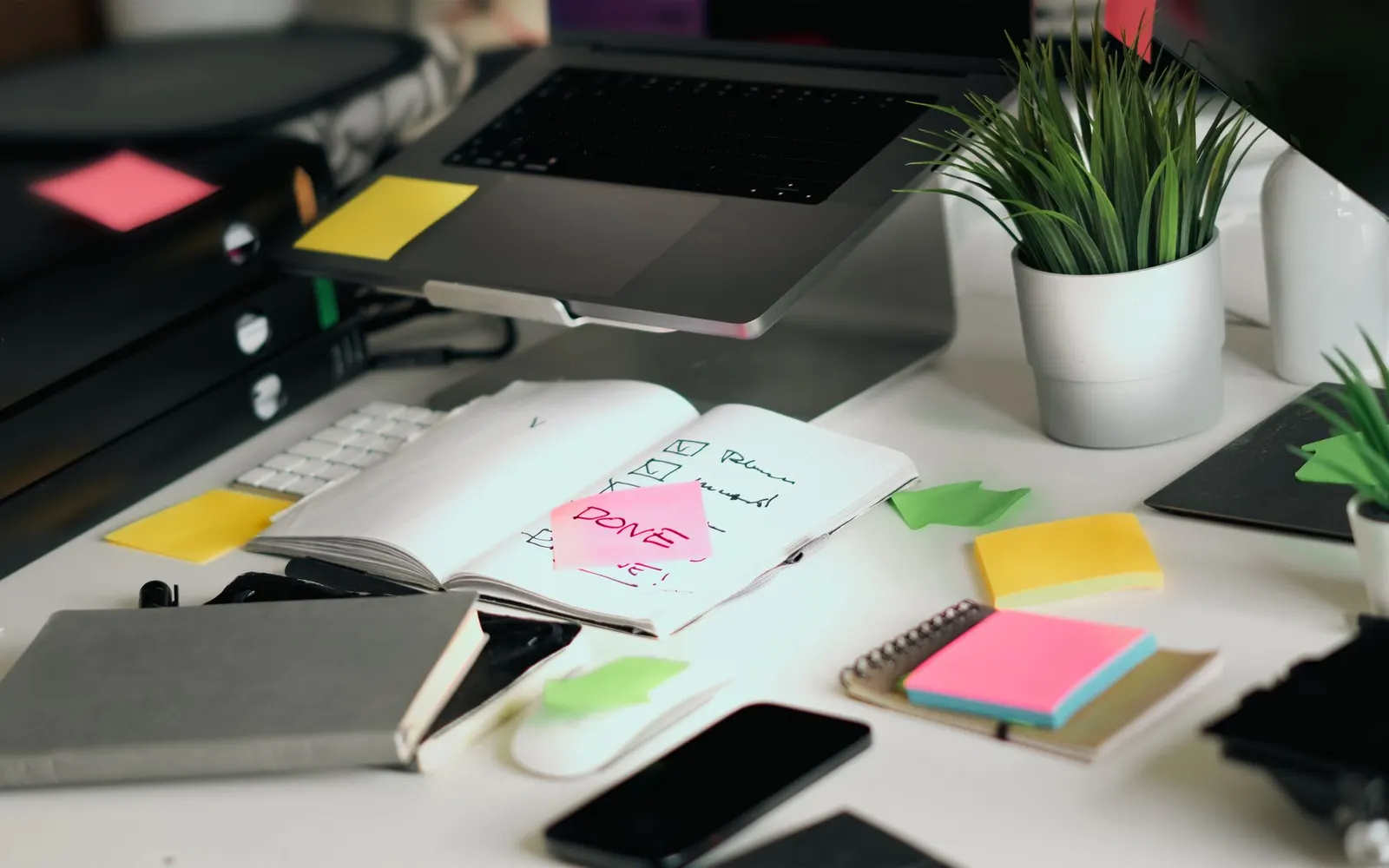 Sticky notes and a laptop — mapping out what changes a website quote