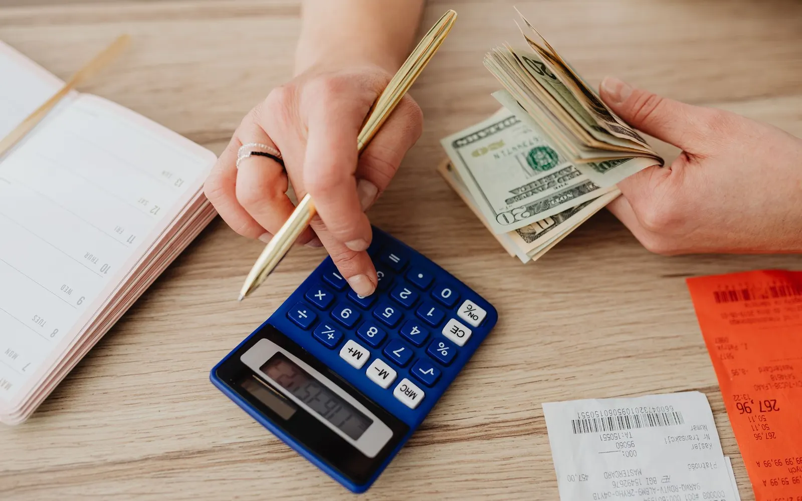 Calculator and notebook on a desk — working out how much a website costs in Jacksonville