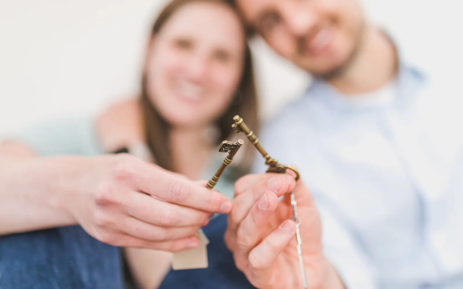 A set of keys being handed over — ownership of the website
