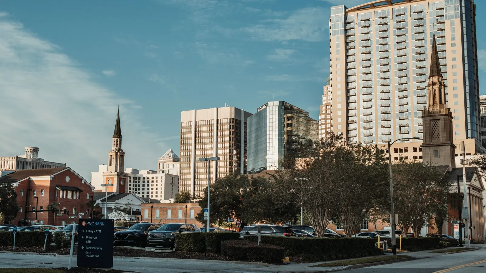 Church steeples and downtown Tallahassee towers in warm evening light